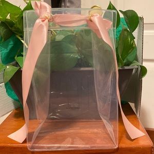 Lancôme transparent bag with pink ribbon